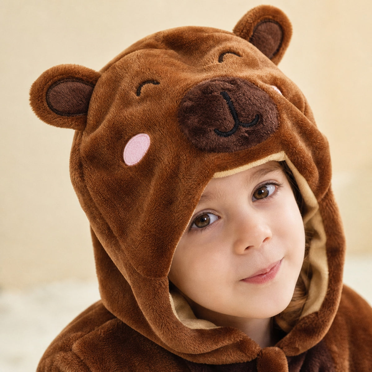 Close-up of the bear hood with snout, ears and rosy cheeks