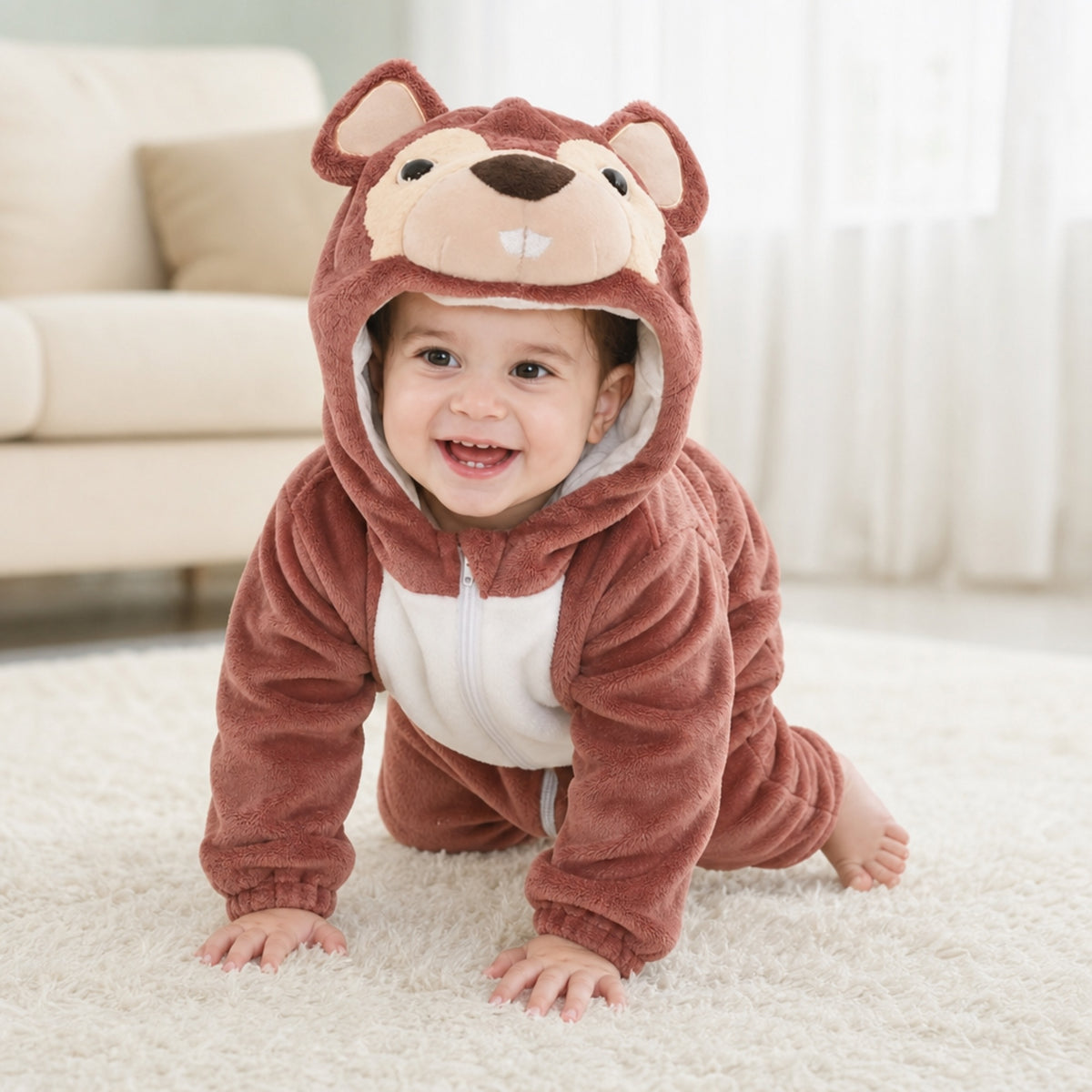 Smiling baby crawling in a plush squirrel costume